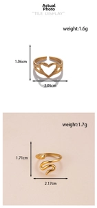 Detailed view of gold snake and heart rings with dimensions and weight info