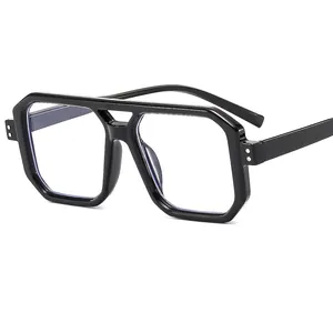 Modern double bridge polygon sunglasses in black frame with metallic rivet details