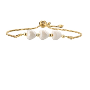 Elegant gold box chain bracelet featuring three white ceramic hearts and adjustable slider