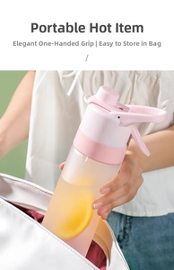 Pink matte spray water bottle being placed into a bag showing portable storage design