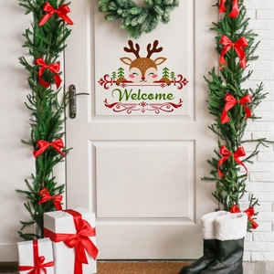 Christmas door sticker with cartoon reindeer, pine tree and Welcome text on a white door