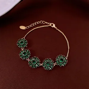 Bracelet tournesol plaqué or 18 carats avec cristaux verts et chaîne réglable