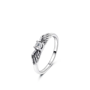 S925 sterling silver angel wing ring with a sparkling round crystal on white background
