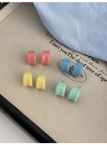 Set of four colorful candy-colored C-shaped stud earrings in glossy enamel finish