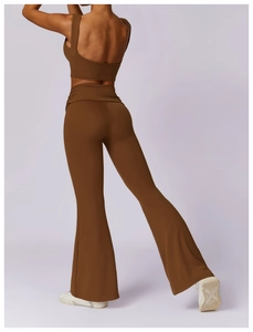 Detail view of chocolate brown flare yoga leggings with a high-waisted lifting design