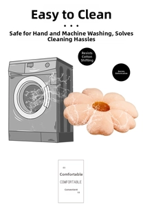 Machine washable pink flower plush cushion showing durable shape and soft fabric texture