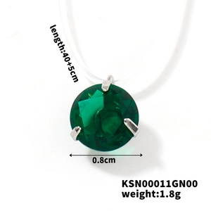 Macro detail of a 0.8cm green zircon pendant with three-prong setting and size specifications