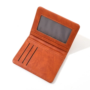Detailed view of brown PU leather bifold wallet with ID window and three vertical card slots