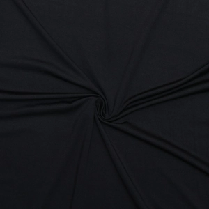 Close-up of black mesh fabric texture and soft pleats of the off-shoulder long dress