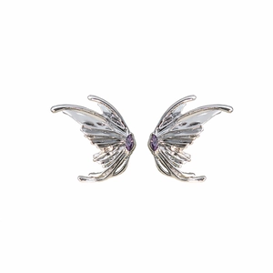 Silver liquid metal butterfly wing earrings with purple crystal stones on white background