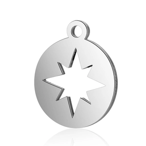 Macro shot of silver stainless steel round pendant with hollow octagonal star pattern
