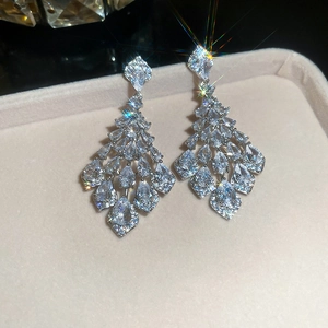 Sparkling silver fringe drop earrings with heart cubic zirconia for luxury evening wear