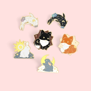 Cartoon animal enamel pins set with koi fish, foxes and bunnies on pink background
