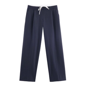 Navy blue pinstripe wide leg trousers with white drawstring waist on white background
