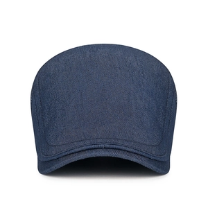 Classic dark blue denim flat top duckbill cap with adjustable strap and visible stitching