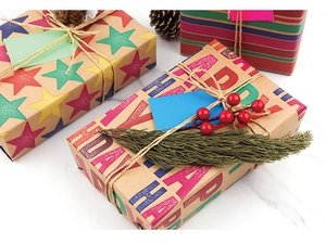 Detail of colorful Happy Birthday kraft wrapping paper set with jute twine and gift tags