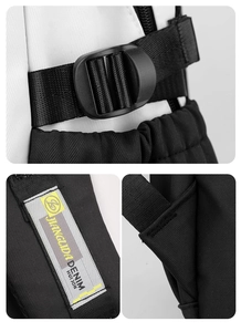 Close-up of adjustable strap buckle and durable stitching on contrast panel backpack