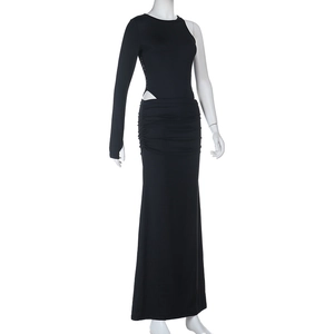 Detailed view of black one-shoulder dress with side cut-out and delicate ruching texture