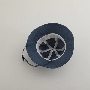 Detail view of quick-dry sun hat interior with sweatband and adjustable windproof cord