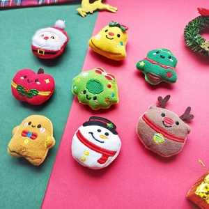 Set of 8 plush Christmas charms including Santa, snowman and reindeer on festive background