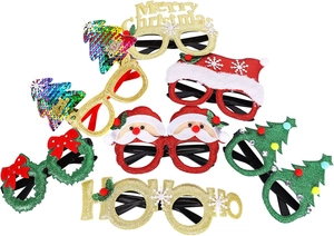 Flat lay of diverse Christmas party glasses with glitter, sequins, and plush festive designs