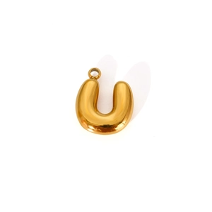 Detailed macro view of 3D bubble style letter U pendant in polished gold titanium steel
