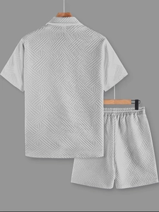 Detail of light gray men's short sleeve shirt set with 3D geometric jacquard texture