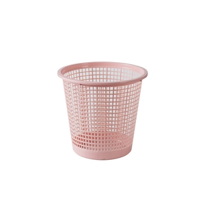 Pink hollow plastic basket for laundry and waste storage in minimalist circular design