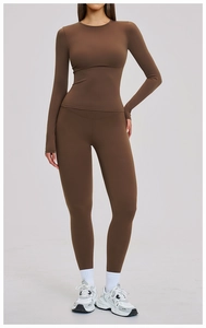 Detail view of coffee brown yoga set with high waist leggings and long sleeve crop top