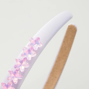 Cerchietto minimalista in raso bianco con stelle rosa cangianti per capelli da donna