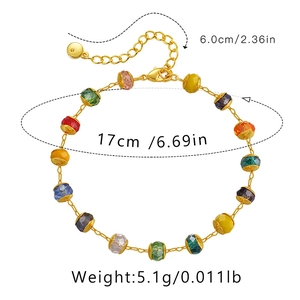 Detail of 18K gold plated bracelet with colorful multifaceted beads and extension chain