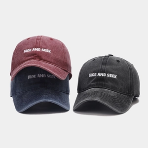 Vintage washed cotton baseball caps with HIDE AND SEEK embroidery in multiple colors