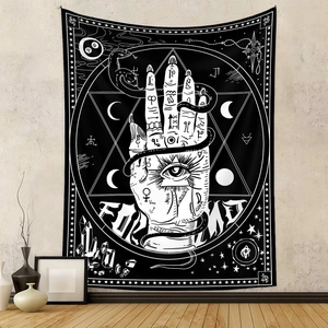 Detail of occult tapestry with mystical hand, serpent and astrology symbols on wall