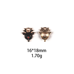 Front and back detail of 16x18mm black enamel reindeer alloy pendant charms