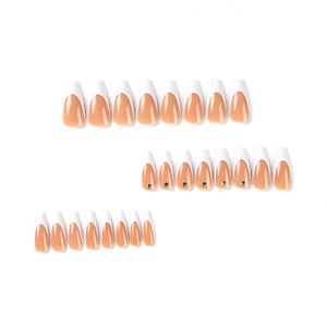 French tip coffin fake nails in nude pink with rhinestones, set of multiple sizes