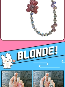 Close-up of sparkling rhinestone bear pendant and iridescent beads for phone strap accessories