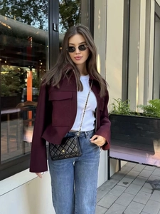 Women's burgundy wool blend jacket with large pockets and zipper in street style