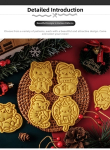 Christmas cartoon cat cookies on a woven mat with festive red holiday decorations