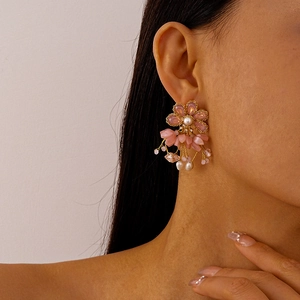 Elegant pink flower tassel earrings with freshwater pearls and gold-tone metal hooks
