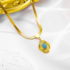 Bohemian gold flat snake chain necklace with floral blue turquoise pendant set on silk
