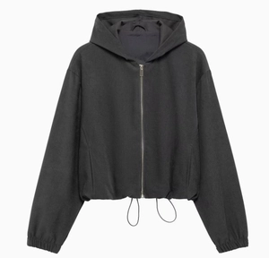 Detail of black hooded bomber jacket with full zipper and drawstring hem for women