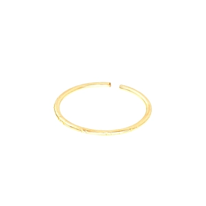 Close-up of golden triple-layered crossover open ring with detailed textured surface