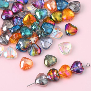 Macro shot of 10mm iridescent heart-shaped glass crystal beads for DIY jewelry making