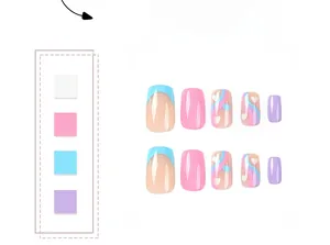 Detailed flat lay of macaron press-on nails with blue French tips and white heart patterns