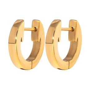 Close-up of gold-plated stainless steel huggie hoop earrings with a polished finish