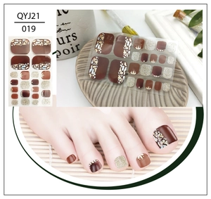 Detailed toe nail stickers set with earth tones, stone patterns, and pearl accents