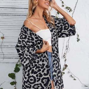 Detail view of lightweight leopard print cardigan showing thin fabric and casual style