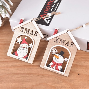 Handcrafted wooden Christmas tree ornaments featuring Santa and Snowman with XMAS text