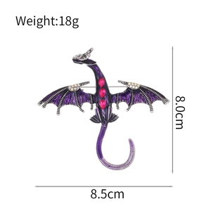 Purple dragon brooch with crystal accents and enamel finish measuring 8.5cm by 8.0cm