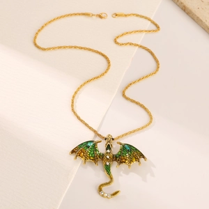 Vintage golden dragon pendant necklace with green enamel and sparkling rhinestones